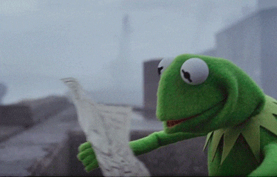 Kermit the Frog holding a map